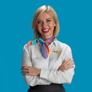 Here’s Why Cabin Crew Sits On Their Hands During Take Off and Landing